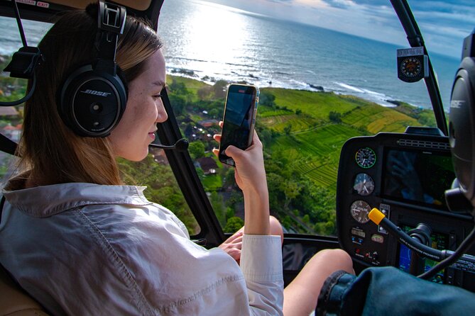 Above the Island of Gods Helicopter Tour - Taking off near Nusa Dua