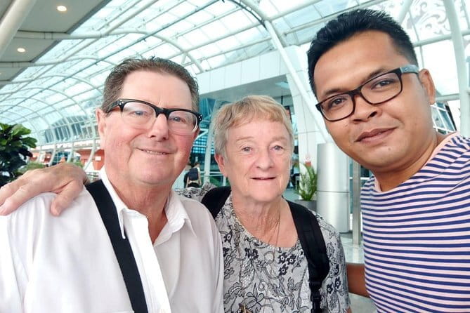 Airport Transfer Check in OR Check out Seminyak Area - Arriving at Bali Airport with a name sign