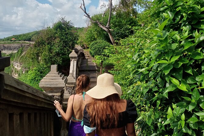 All Inclusive Kecak Dance and Uluwatu Temple Admission Ticket - Walking through Uluwatu Temple before the show