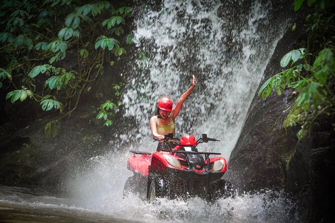 ATV Quad Bike Kuber Through Waterfall, Tunnel And Rice Field - Waterfalls bring the wettest part of the ride