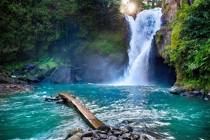 Bali Adventure Tour: Hidden Canyon, Tegenungan Waterfall, Goa Gajah temple - Gunung Kawi adds older stone monuments