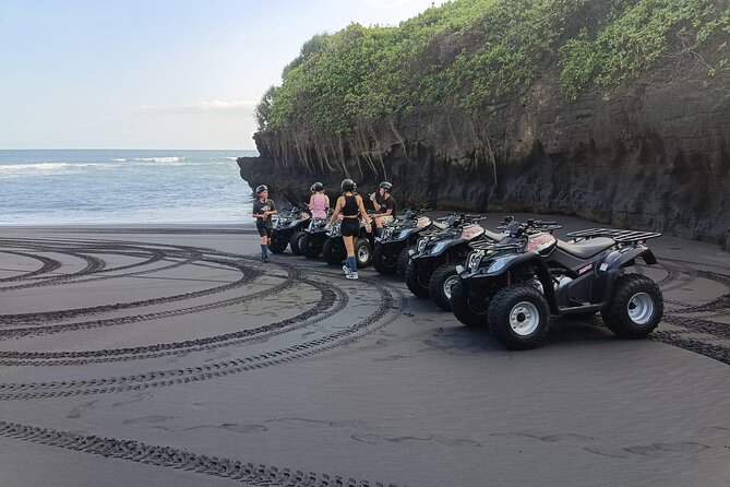 Bali ATV Ride In the beach sunset atv tour - Crossing the beach and volcanic shoreline