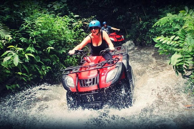 Bali ATV Ride Ubud Waterfall,RiceField,River,Kingkong-Temple cave - The cave and statue sections add a Balinese touch