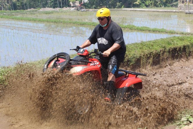 Bali Atv Riding through Cave and Waterfall - River crossings, waterfall, and cave sections