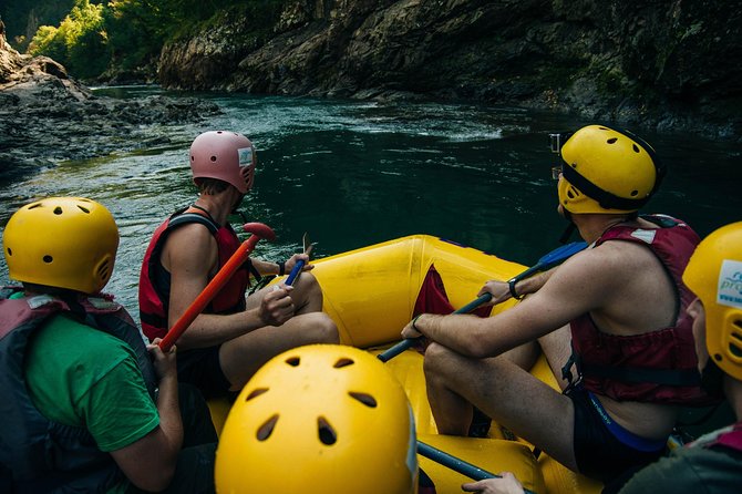 Bali Rafting Ubud with Lunch - Paddling through cliffs, rice fields, and waterfalls