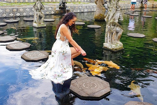 Bali Sky Gate and Water Palace - Tirta Gangga, a royal bathing palace with clear spring water