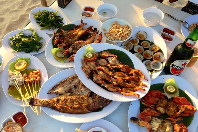 Bali Water Sports and Uluwatu Tour Packages - Seafood at Jimbaran Bay