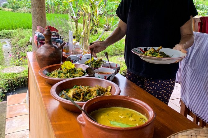Balinese Vegan Cooking Class with Fresh Harvesting & Garden Tour - Harvesting ingredients in the Sidemen garden