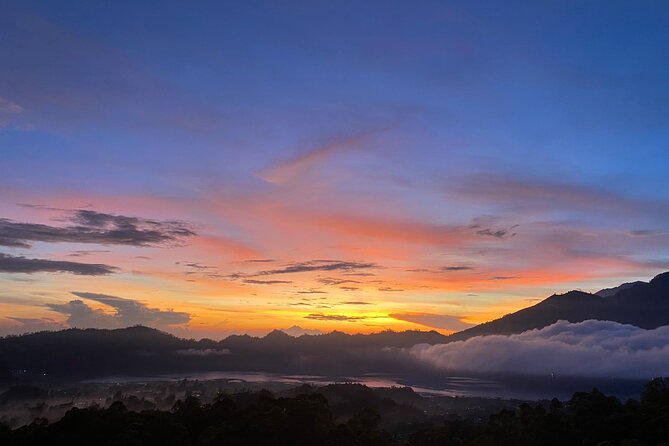 Batur Volcano Sunrise And Black Lava Jeep Adventure Tour - Guide care matters on dark volcanic ground