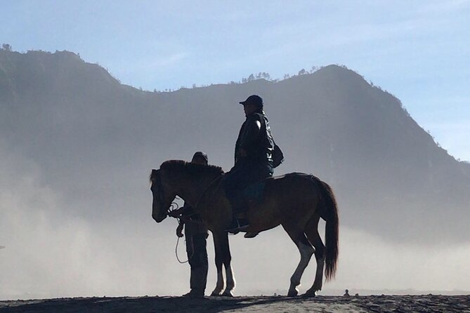 Bromo sunrise tour via Tumpang - start Malang // 1 day tour - Coban Pelangi Waterfall adds a demanding finish