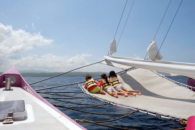 Full day Lembongan Island Catamaran Cruise with BBQ Lunch - Sailing from Seminyak toward Nusa Lembongan