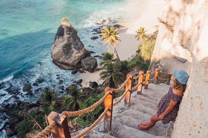 Full Day Private Tour to Nusa Penida Underground Temple from Bali - Diamond Beach, white sand below high cliffs