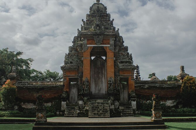 Full Day Private Tour to Ubud Waterfall and Tanah Lot Sunset - Tegenungan Waterfall: a strong first stop