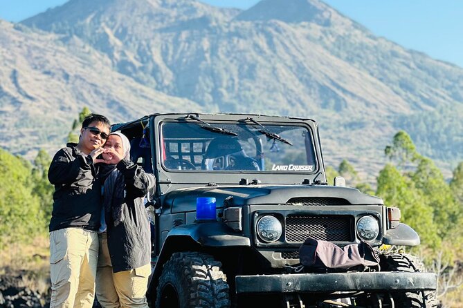 Mount Batur Jeep Sunrise Tour - All Inclusive - Sunrise from a quieter slope