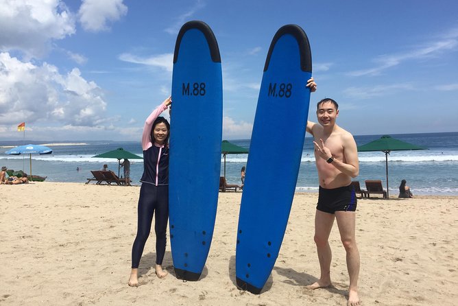 Private surf lesson - Moving from the sand into Kuta’s waves