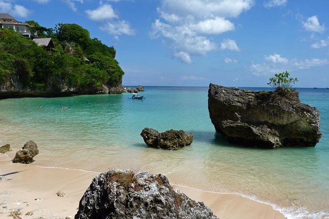 Private Tour Bali Beaches and Uluwatu Temple with Dinner - Pandawa Beach and the carved cliff approach