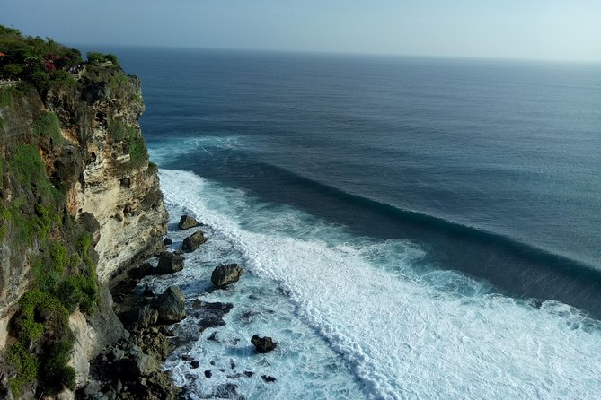 Private Tour Bali Beaches and Uluwatu Temple with Dinner - Melasti Beach and the best sunset setting