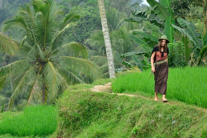 Private Tour Ubud: Swing at Rice Field with Temple and Waterfall - Manuaba Waterfall: a cool finish on rural trails