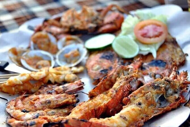 Romantic Seafood Dinner at Jimbaran Beach Bali include Sunset - Jimbaran Bay puts dinner right on the beach