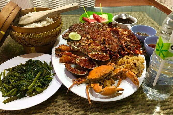 Romantic Seafood Dinner at Jimbaran Beach Bali include Sunset - Package A gives you a full seafood spread