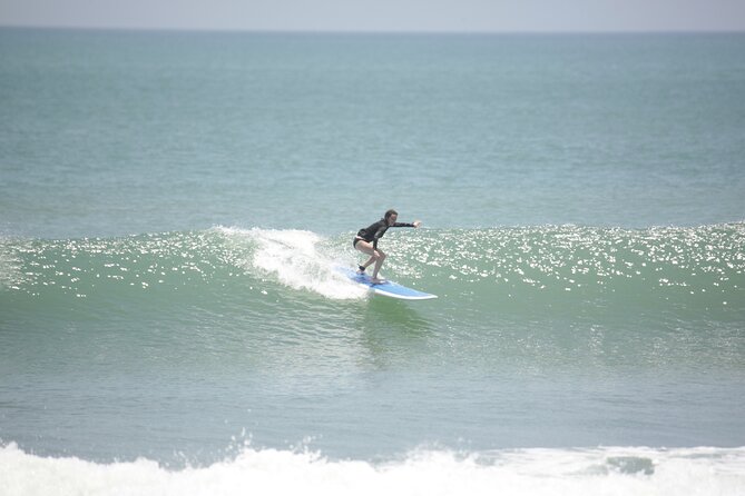Surfing Activity with Beginner and Intermediate Lesson - The first lesson: safety, boards, and foam waves