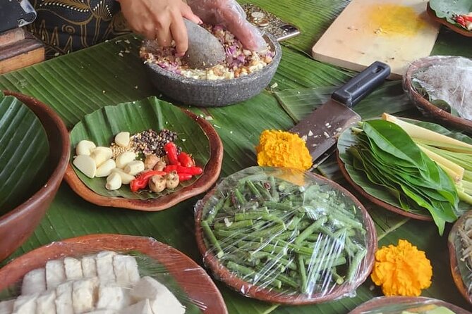 Traditional Balinese Cooking Class with Ubud Tour - Picking fresh produce by bicycle