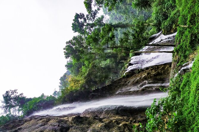 Tumpak Sewu Waterfalls - The Semeru backdrop and changing weather