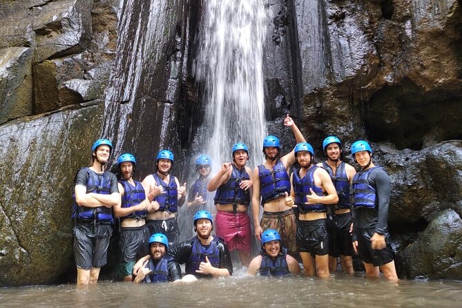 Ubud ATV Quad Bike with Ayung River Rafting Experience - Riding ATVs through rice fields and waterfalls