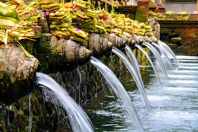 Ubud Bali: Rice Terrace, Waterfall and Tirta empul Day Tour - Kanto Lampo Waterfall gives the day its outdoor break