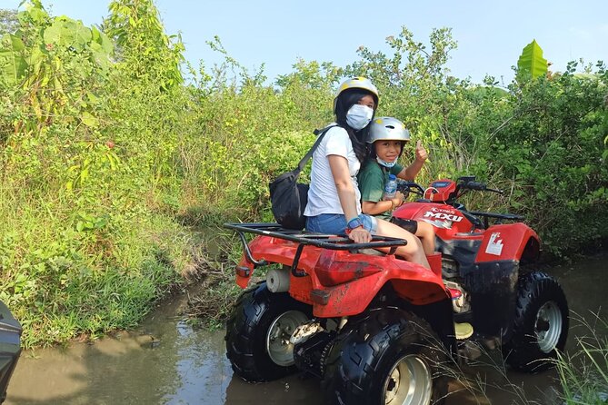 Ubud Countryside Sightseeing Tour by ATV Ride - Riding from Jalan Raya Kengetan into the countryside