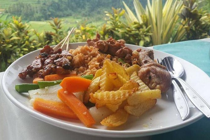 Ubud Hot Springs and Waterfall Private Guided Tour - Toya Devasya hot springs beside the volcano