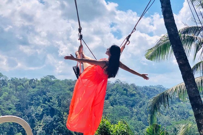 Ubud Natural Gems And Secret Waterfall Private Guided Tour - Taking the swing at Happy Swing Bali